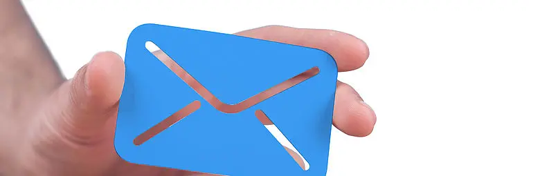 hand holding blue envelope
